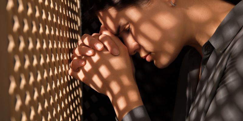 Catholic Woman Doing A Confession