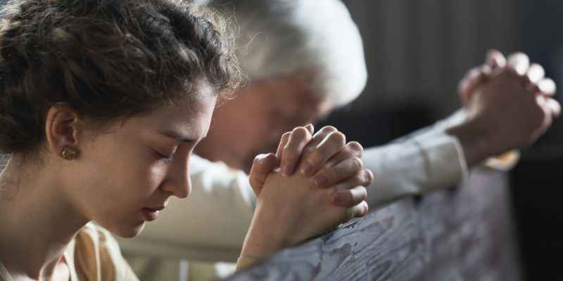People Praying in the Catholic Church