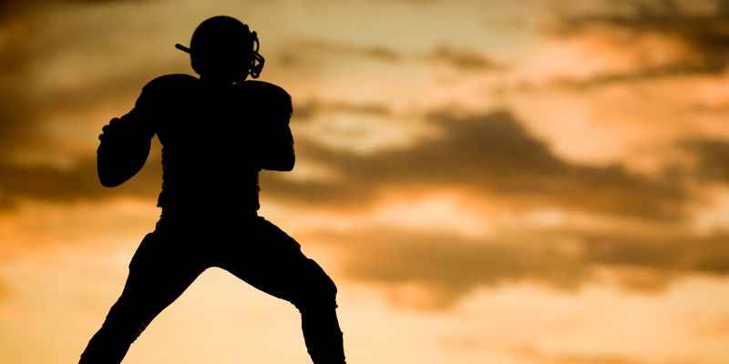 Silhouette Shot of A NFL Football Player